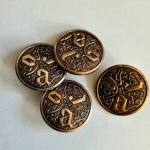 4 vintage large metal buttons with letters.